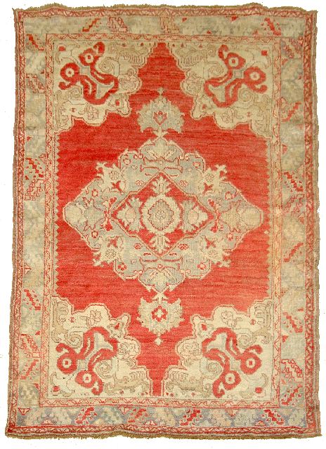 An Antique Turkish Ushak Wool Rug