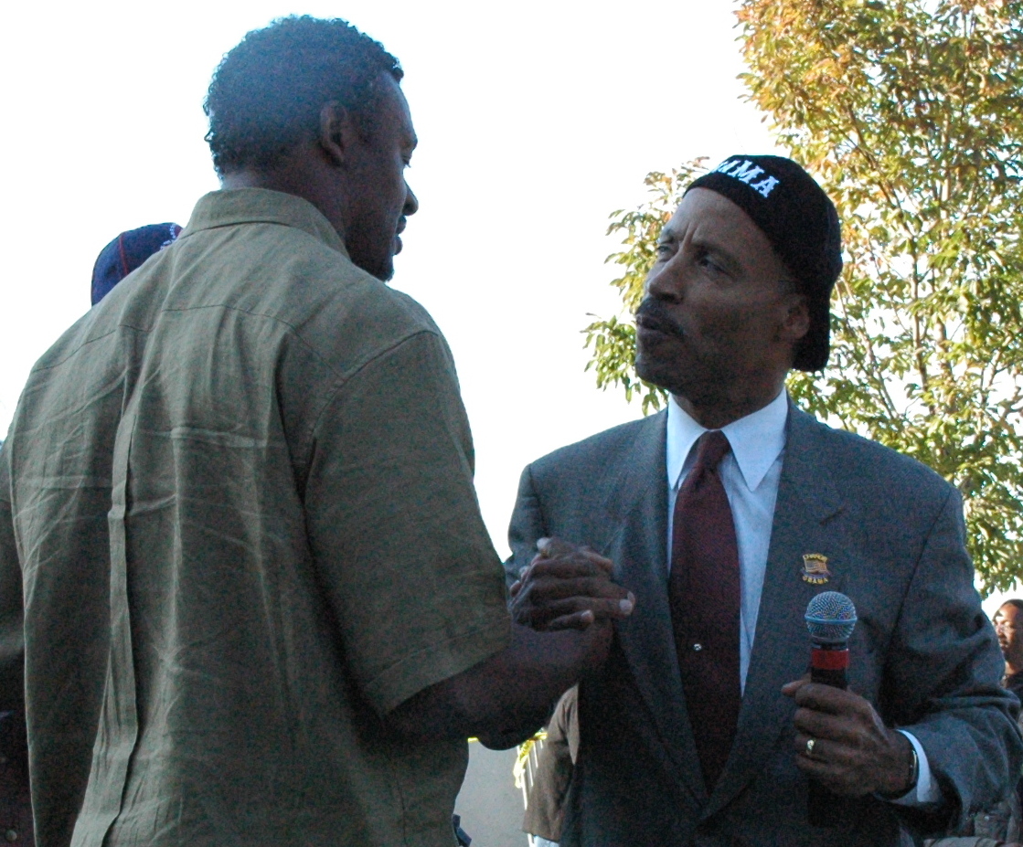 Cuyahoga County Commissioner Peter Lawson Jones Greeting Cleveland Browns Pro-Bowl Linebacker Willie McGinest